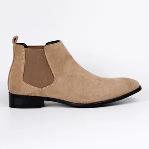 Detailed side view of khaki suede men's Chelsea boots with a square toe design.