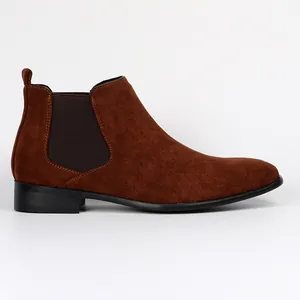 Side profile of a brown suede men's Chelsea boot with classic elastic side panel