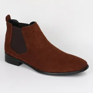 Detailed side view of men's classic brown suede Chelsea boots with square toe design
