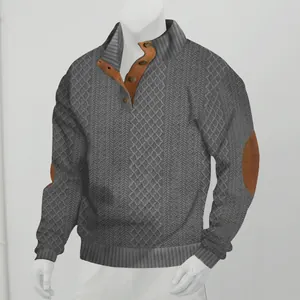 Close-up of men's grey textured cable knit sweater with brown faux leather collar detail