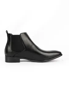 Detailed side view of men's black Chelsea boots with square toe and elastic side panel