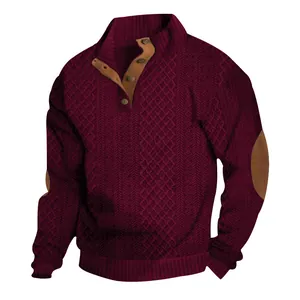 Detail of burgundy men's cable knit sweater with button collar and elbow patches
