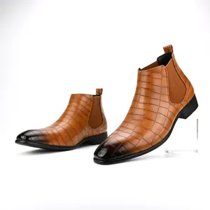 Side view of men's brown crocodile embossed Chelsea boots with square toe gradient detail