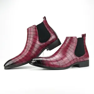 Side view of men's burgundy crocodile embossed Chelsea boots with square toe