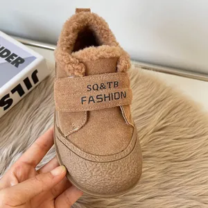 Warm fleece-lined children's winter shoes in brown suede with soft sole and velcro strap