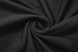 Primer plano macro de la textura de la tela de jersey negro de alta calidad y tejido suave.