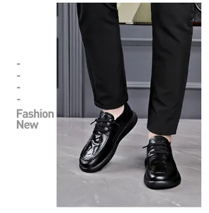 Close-up view of men's black leather lace-up casual shoes with a premium textured finish