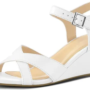 Elegant white wedge sandals for women featuring cross straps and adjustable ankle buckle