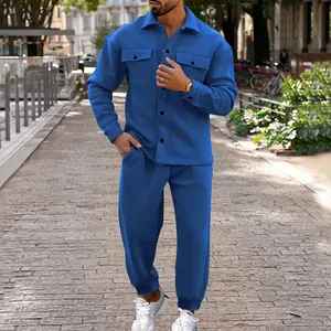 Full body view of royal blue suede tracksuit set for men in an outdoor street setting