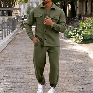 Men's olive green suede jacket and pants two-piece set in stylish outdoor setting