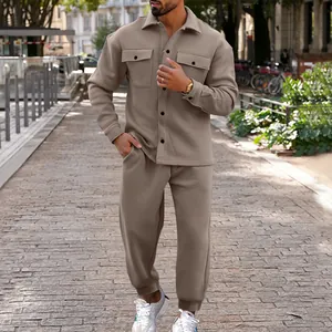 Detailed view of men's khaki suede tracksuit featuring a button-down jacket and pants