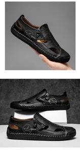 Close-up detail of men's black genuine leather casual loafers with zipper and cutout design