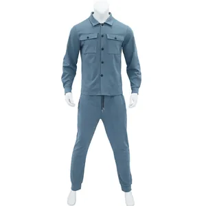 Full view of blue faux suede men's two-piece suit with jacket and joggers on mannequin