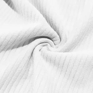 Detailed close-up view of white heavyweight ribbed jacquard fabric for men's sweatshirt