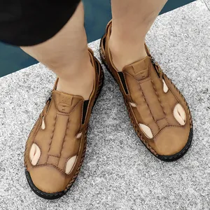 Men's casual brown leather loafers with hollow-out design and durable rubber sole