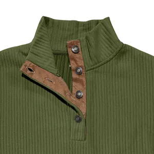Close-up of men's olive green ribbed sweatshirt with stand collar and button detail.