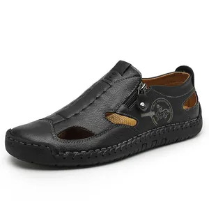 Classic black leather men's loafers with breathable cut-outs and side zipper