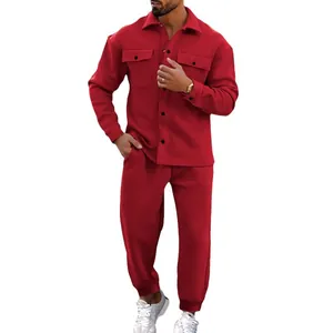 Men's stylish red suede two-piece tracksuit with a button-down jacket and matching jogger pants