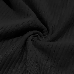 Macro detail view of premium black heavy jacquard ribbed fabric for men's sweatshirt