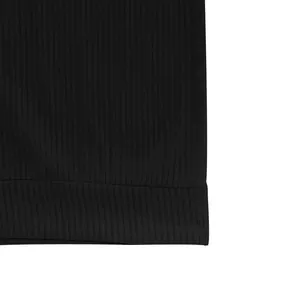 Detailed macro view of high-quality black ribbed knit fabric on a men's sweatshirt.