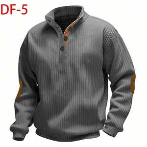 Detailed view of men's grey heavy jacquard sweatshirt with stand collar and elbow patches