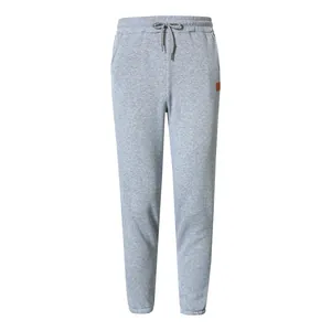 Detail shot of grey men's casual joggers with drawstring waist and pocket