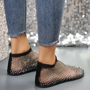 Detailed view of black rhinestone mesh flat ankle sandals for summer fashion style