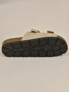 Detail shot of women's platform cork sandals with rugged black outsole