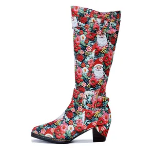 Detailed side view of vintage Christmas high boot with Santa Claus and floral prints