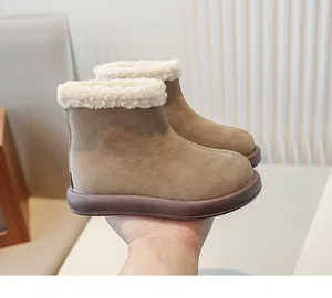 Side view of girls' brown frosted leather snow boots with cozy white fleece lining