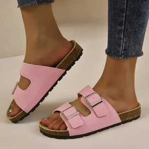 Pink suede double-strap sandals with cork-style soles for summer vacation beach wear