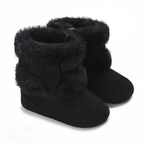 Warm black infant boots featuring soft plush fur trim and soft decorative side bow.