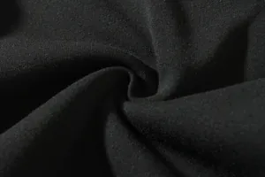 Close-up macro shot showing high-quality black cotton fabric texture for men cargo pants