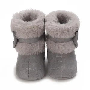 Detailed front view of cozy gray baby boots featuring faux fur trim and soft soles