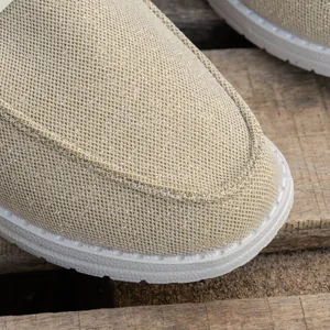 Detailed macro view showing the gold glitter mesh fabric of lightweight women's casual shoes