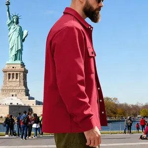 Detailed side view of a red heavyweight fleece-lined men's outdoor warm jacket in a park