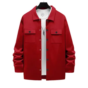 Detailed view of red heavyweight workwear jacket with flap pockets and black buttons