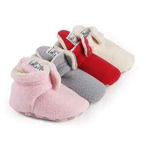 Soft fleece baby booties in multiple colors for winter warmth and first steps