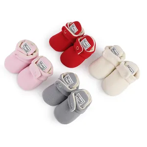 Soft winter fleece baby booties set in pink red grey and cream colors for infants