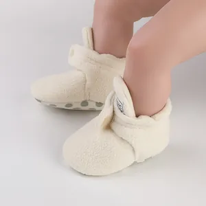 Soft cream fleece baby walking shoes with anti-slip soles for winter warmth