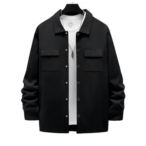 Close-up front view of black heavyweight men's workwear jacket on a clean background