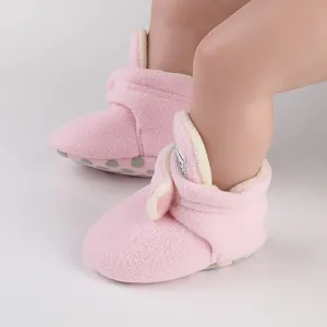 Soft pink fleece baby walker shoes with Velcro strap and non-slip soles for infants