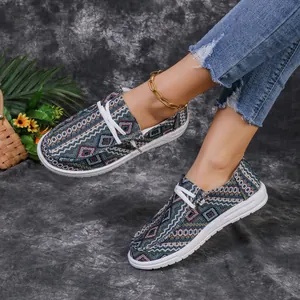 Casual women's loafers with colorful geometric pattern and flat white sole
