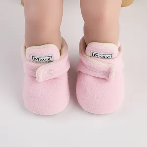 Pink soft fleece baby winter shoes with warm plush lining and magic prewalker label