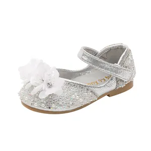 Silver glittery girls princess shoes with white fabric flowers and pearls for parties
