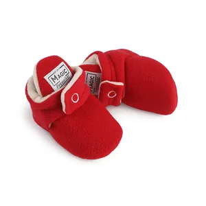 Detailed view of red fleece baby prewalker shoes with warm sherpa lining for winter