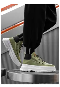 Detailed side view of olive green high-top platform boots featuring thick white soles.