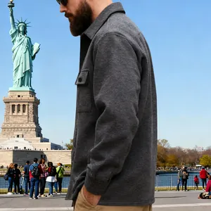 Side view detail of a heavyweight men's grey workwear jacket for outdoor winter use