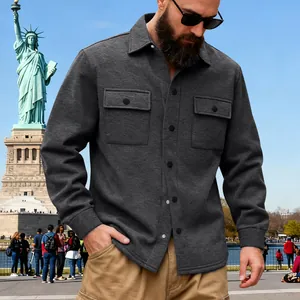 Heavyweight dark grey fleece-lined outdoor shirt jacket for men in stylish urban setting