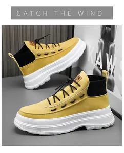 Detailed side view of yellow high-top fashion sneakers with thick white sports soles